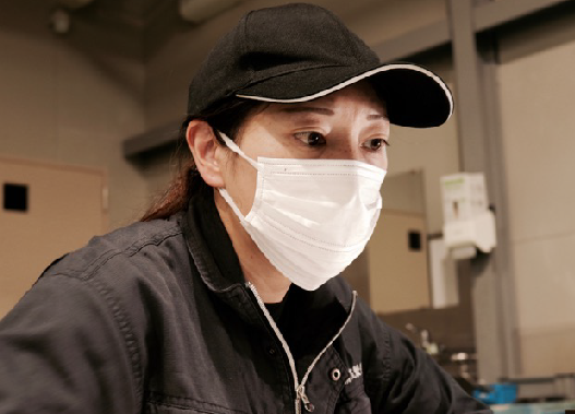 作業着のスタッフ